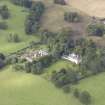 General oblique aerial view of Keith Marischal Country House with adjacent stables, looking to the W.