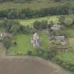 General oblique aerial view of Crichton Parish Church with adjacent churchyard and manse, looking to the W.