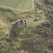 General oblique aerial view of Crichton Castle with The Slaughter House adjacent, looking to the E.