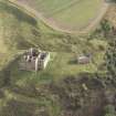 General oblique aerial view of Crichton Castle with The Slaughter House adjacent, looking to the ENE.