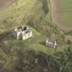 General oblique aerial view of Crichton Castle with The Slaughter House adjacent, looking to the NE.