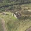 General oblique aerial view of Crichton Castle with The Slaughter House adjacent, looking to the W.
