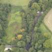 General oblique aerial view of The Lion's gate, Preston Hall with the Tyne Bridge adjacent, looking to the N.