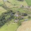 Oblique aerial view of Cakemuir Castle, looking to the W.