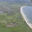 General oblique aerial view of Machrihanish Golf Course and Langa Quarry, looking SSW.