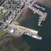 Oblique aerial view of Campbeltown Harbour, looking NW.