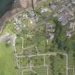 Oblique aerial view of Kilkerran Cemetery and St Ciarans Old Parish Church, looking NE.