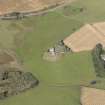 Oblique aerial view of Kildrummy Parish Church, taken from the SE.