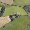 Oblique aerial view of Kildrummy Parish Church, taken from the NW.
