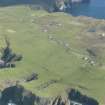 General oblique aerial view of Stonybrek, Fair Isle, looking NE.