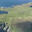 General oblique aerial view of Stonybrek, Fair Isle, looking NW.