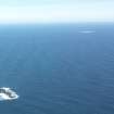 General oblique aerial view of Sule Stack with Sule Skerry in the distance, taken from the SSW.