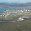 General oblique aerial view of Sullom Voe Oil Terminal, looking W.