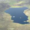 General oblique aerial view of Symbister and Loch of Huxter, looking NW.