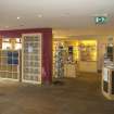 Interior. View looking across the entrance hall of the Bannockburn Heritage Centre to the reception desk and shop.
