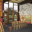 Interior. View of double height windows, mural and interpretive panels within the education room