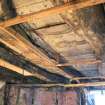 Interior. view of (possibly re-used) ceiling beams supporting the second floor.