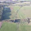 Oblique aerial view of the archaeological evaluation trenches in advance of the A75 Dunragit Bypass construction.