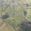 Oblique aerial view of the archaeological evaluation trenches in advance of the A75 Dunragit Bypass construction.