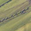 Oblique aerial view of the archaeological evaluation trenches in advance of the A75 Dunragit Bypass construction.