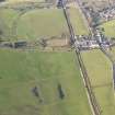 Oblique aerial view of the archaeological evaluation trenches in advance of the A75 Dunragit Bypass construction.