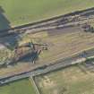 Oblique aerial view during excavation.