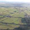 Oblique aerial view of the archaeological evaluation trenches in advance of the A75 Dunragit Bypass construction.