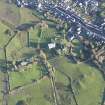 Oblique aerial view centred on Whithorn parish church, looking E.