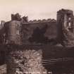 Tantallon Castle, view showing Bass Rock in distance.
Titled: 'Tantallon and Bass Rock, 7088 G.W.W.'
PHOTOGRAPH ALBUM No. 195:George Washington Wilson Album, p.135.
