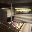 Interior. View looking down staircase leading to platform level within Bridge Street subway station