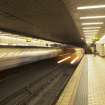 Interior view looking along platform and tracks of Govan Cross Subway Station, 771-5 Govan Road, Glasgow, with trains arriving at both platforms.