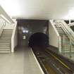 View looking along platform to tunnel opening and stairs leading up towards concourse level of Hillhead subway station