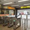 View of turnstiles, ticket office and main entrance of West Street subway station