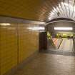 View looking along tiled corridor towards stair and platform of Shields Road subway station