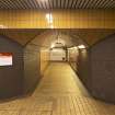 View looking along tiled corridor leading to platform level of Shields Road subway station