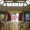 View looking back across the concourse of Shields Road subway station, including turnstiles, ticket office and main entrance