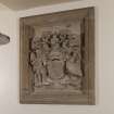 Interior. Detail of stone carved armorial panel with coat of arms