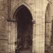 View of south transept from west showing lady standing, Melrose Abbey.