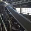 Interior. Boiler house, coal handling system, 'iron horse' at top of conveyor.