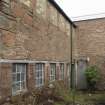 View of rear of east range. Former workshop. Disused and not part of the Curling Stone Factory. the extension is Leefield House which was partly used for Finishing (ground floor).