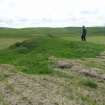The mound from the NW with Mr John Sherriff standing to the right