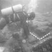Keith Muckelroy measuring the large anchor, almost certainly belonging to El Gran Grifón, found some 60m to seaward of the main site in a depth of 23m (1977).