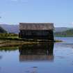 General view of Achranich boathouse, looking down Loch Aline towards Mull, showing the boulder quay and the spit of land on which the boathouse sits. (Paula Martin)