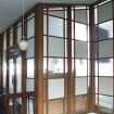Interior. View of glazed screen and entrance doors from lobby