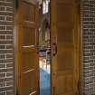 Interior. Entrance lobby, view of double doors leading into church
