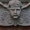 Detail of relief showing an angel's head and wings, Dean Cemetery, Edinburgh.