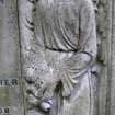 Detail of relief showing angel at side of headstone, Newington Cemetery, Edinburgh.