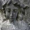 Detail of relief showing the head and neck of an angel, Dean Cemetery, Edinburgh.