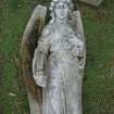 Image showing a statue of an angel holding flowers, fallen. Warriston Cemetery, Edinburgh.