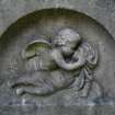 Detail of relief showing two angels kissing, Dean Cemetery, Edinburgh.